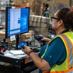 woman working in a fulfillment center